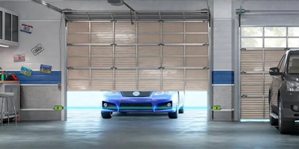 Garage door safety sensor being displayed, showing the photoelectric sensor unit mounted on the door track with the infrared beam path illustrated