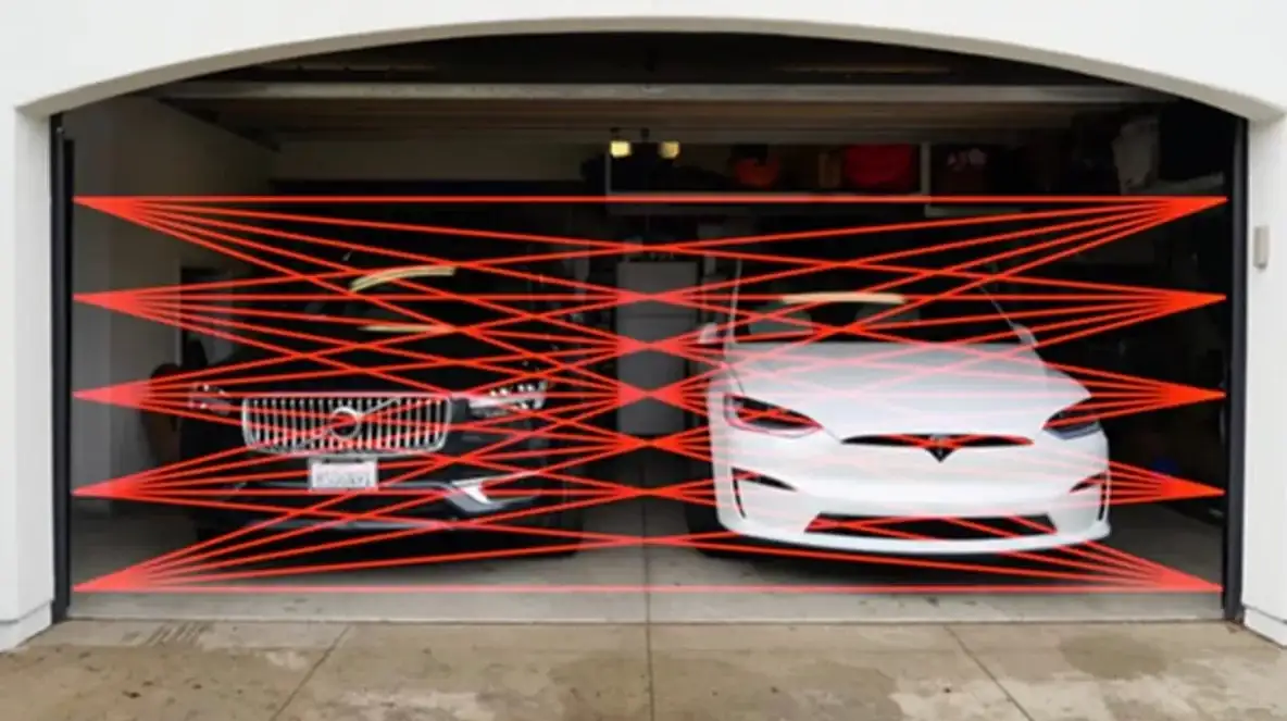 Visual display of a garage door photoelectric safety sensor showing the infrared beam and sensor alignment